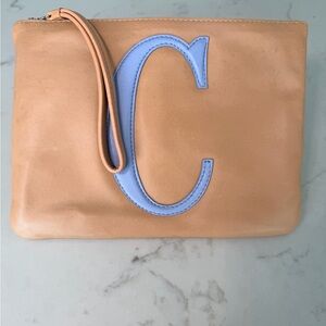 Elegant Tan Wristlet with Blue Accent “C” NWOT